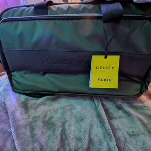 Delsey Paris Olive Green Duffel Bag with Carry Handles and Shoulder Strap